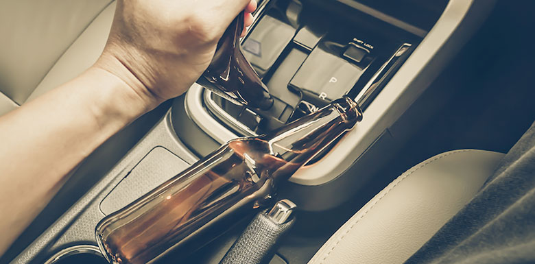 Alcohol bottle empty while driving