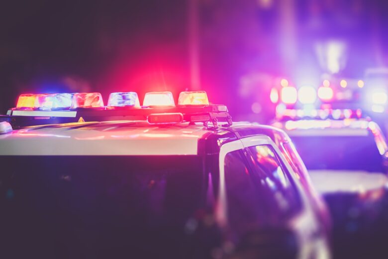 Police cruisers line up for an OWI traffic stop in Detroit, pulling a driver over instead of using a checkpoint